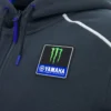 Monster Energy Yamaha MotoGP 2026 Man Travel Replica Full Zip Sweatshirt Monster Energy Yamaha MotoGP 2026 Man Travel Replica Full Zip Sweatshirt